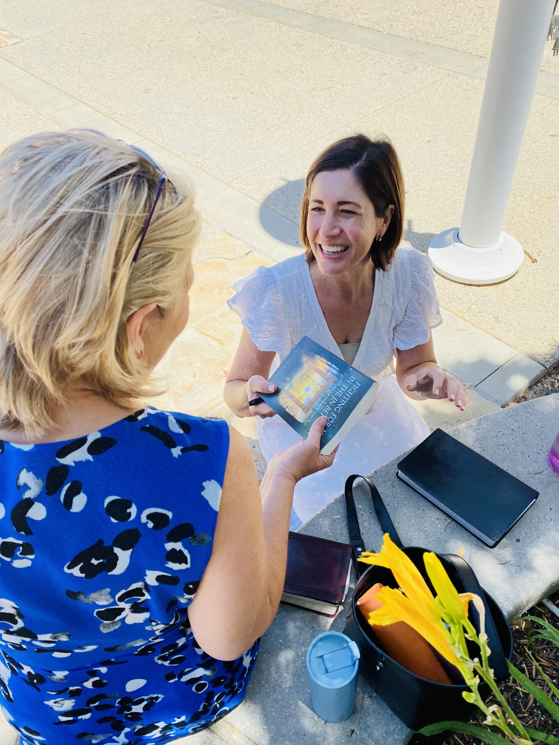 Giving out copies of FFJ